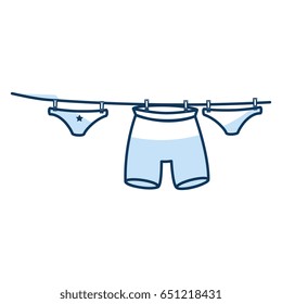 clothes hanging in the laundry