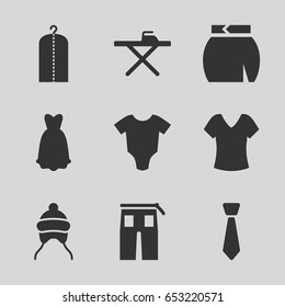 Clothes icons set. set of 9 clothes filled icons such as baby onesie, baby cap, shirt, ironing table, clothes on hanger, pants, skirt, dress