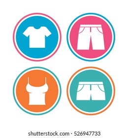 Clothes icons. T-shirt and pants with shorts signs. Swimming trunks symbol. Colored circle buttons. Vector