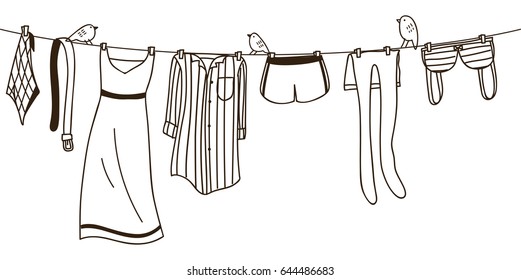 Clothes on washing line isolated on white background 