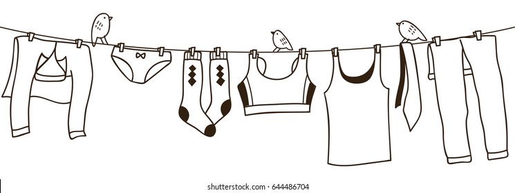 Clothes on washing line isolated on white background 