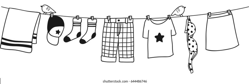 Clothes on washing line isolated on white background 