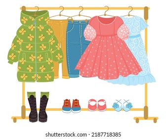 Clothes And Shoes Storage. Dresses Hanging On Rack