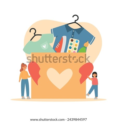 Clothes volunteering donation concept. Mum and daughter with half of hearts near donation cardboard box with clothes to charity. International charity day