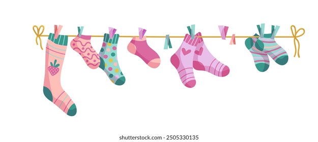 Wäscheleinen-Socken. Socken auf einem Seil, Babysocken mit Mustern, Vektorgrafik