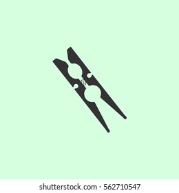 Clothespin icon flat. Grey vector symbol on green background