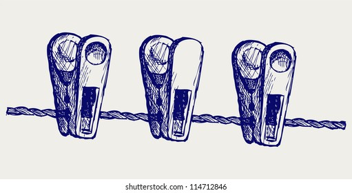 Clothespins on rope. Doodle style