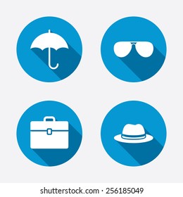 Clothing accessories icons. Umbrella and sunglasses signs. Headdress hat with business case symbols. Circle concept web buttons. Vector