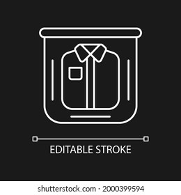 Clothing in plastic bag white linear icon for dark theme. Clear compress wrap for garment packing. Thin line customizable illustration. Isolated vector contour symbol for night mode. Editable stroke