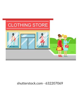 Clothing store building and two smiling women with shopping bags