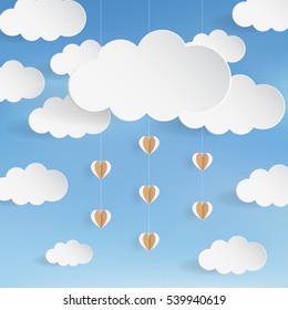 Cloud with hanging origami heart paper on blue background and blank space for text 