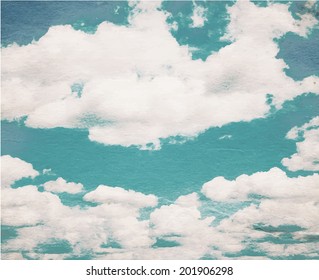 Cloud and sky on grainy paper.