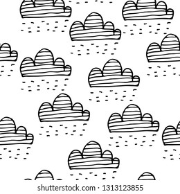 Clouds doodle seamless texture. Kids seamless pattern. Childish design. Vector textile and wrapping pattern design. Vector hand drawn illustration.