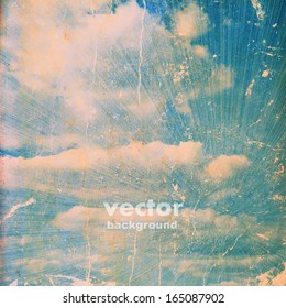 clouds on a textured vintage paper vector background, with grunge stains