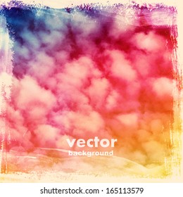 clouds on a textured vintage paper vector background, with grunge stains