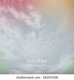 clouds on a textured vintage paper vector background, with grunge stains