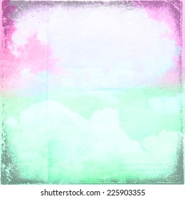 clouds on a textured vintage paper vector background, with grunge stains