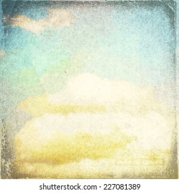 clouds on a textured vintage paper vector background, with grunge stains