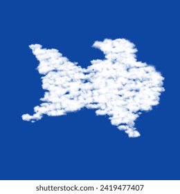 Clouds in the shape of a gold fish symbol on a blue sky background. A symbol consisting of clouds in the center. Vector illustration on blue background