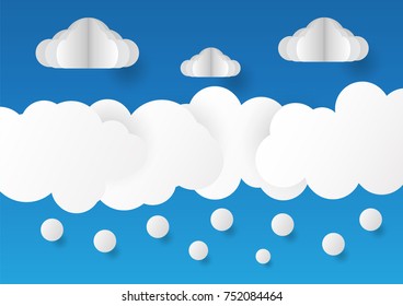 Clouds and snow isolated on blue background in paper cut style.
