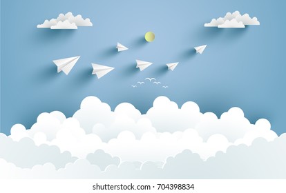 clouds and there are paper planes on it with paper and craft art designs