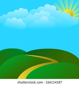 Cloudy landscape with green hill