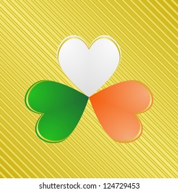 Clover in colors of irish flag on the golden striped background.