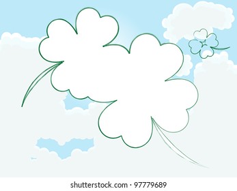 Clover frame on cloudy sky - place for your photo