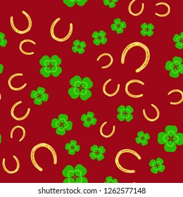 Clover and horseshoe on red background - seamless vector pattern. Symbols of good luck. For wrapping paper, prints, backdrops.