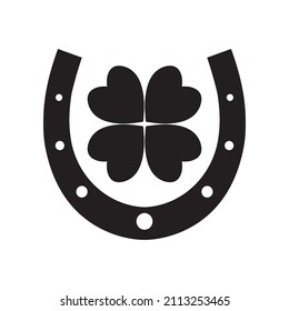 Clover in horseshoe for St. Patrick Day, irish holiday, luck vector black icon isolated on white background. Fortune illustration