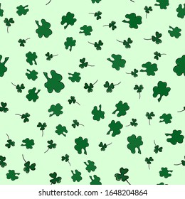 Clover leaf hand drawn doodle seamless pattern vector illustration. St Patrick's Day symbol, Irish lucky shamrock background. Ideal for gift paper, patterns, textiles, St. Patrick's day greeting cards
