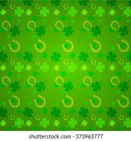 Clover leaf an horseshoe  on green background for happy St. Patrick's Day