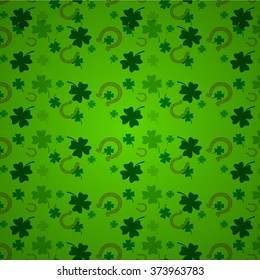 Clover leaf an horseshoe  on green background for happy St. Patrick's Day
