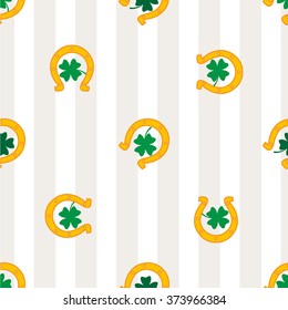 Clover leaf and horseshoe on white background for happy St. Patrick's Day