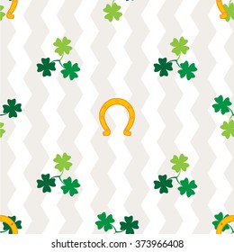 Clover leaf and horseshoe on white background for happy St. Patrick's Day