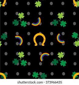 Clover leaf, horseshoe and rainbows on black background for happy St. Patrick's Day