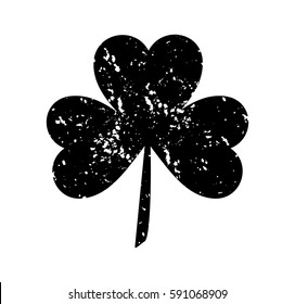 Clover leaf isolated black on white background. Silhouettes of three leaf clover in flat style with abrasion, spots and scratches. The effect of abrasion and distressed. 