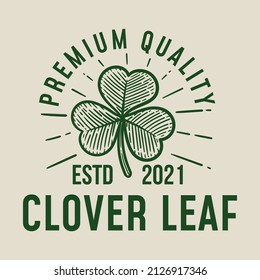 
clover leaf logo in vintage style on grey background