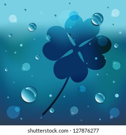 Clover leaf on glass and water drop.EPS10