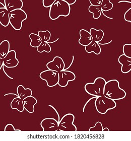 Clover leaf outline on a burgundy background. Vector illustration with leaves. Abstract floral ornament, simple shapes traditional holiday vector background for wrapping, textile, digital paper