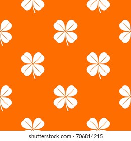 Clover leaf pattern repeat seamless in orange color for any design. Vector geometric illustration