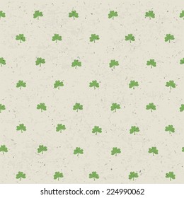 Clover leaf seamless pattern on paper texture. Background for St. Patric`s Day. Vector