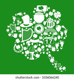 clover leaf with st patrick icons on green background

