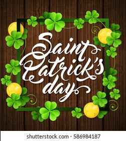 Clover leaves and golden coins in a green frame on a wooden background. Card design for St. Patrick's day.