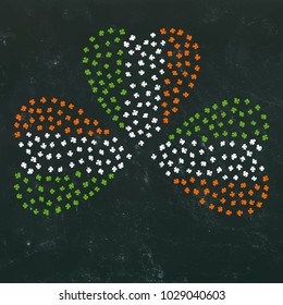 Clover Leaves Heart Shaped Colored in Ireland National Flag Colours Green, White, Orange. On a Black Board Background. St Patricks Day Vector Illustration Hand Drawn. Doodle Style.