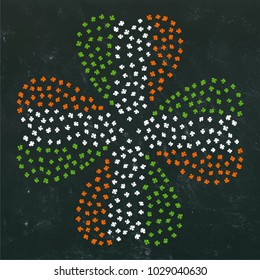 Clover Leaves Heart Shaped Colored in Ireland National Flag Colours Green, White, Orange. On a Black Board Background. St Patricks Day Vector Illustration Hand Drawn. Doodle Style.
