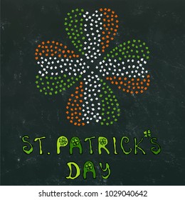 Clover Leaves Heart Shaped Colored in Ireland Flag Colours Green, White, Orange. On a Black Board Background. With St Patricks Day Lettering. Vector Illustration Hand Drawn. Doodle Style.