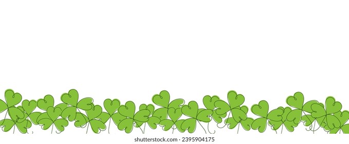 Clover leaves on a white background for St. Patricks Day. Outline clover leaves drawn in one continuous line in template for banner, flyer, background