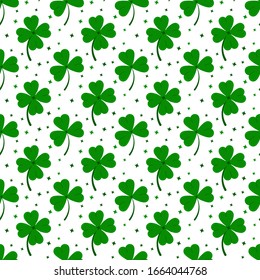 Clover leaves seamless pattern isolated on white background: green lucky four leaf clover or shamrock clover. Flat design cartoon style vector floral endless texture for Irish St. Patrick's day.