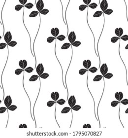 Clover leaves. Seamless  pattern on white. Vector. Art floral background.  Silhouettes. Black and white.